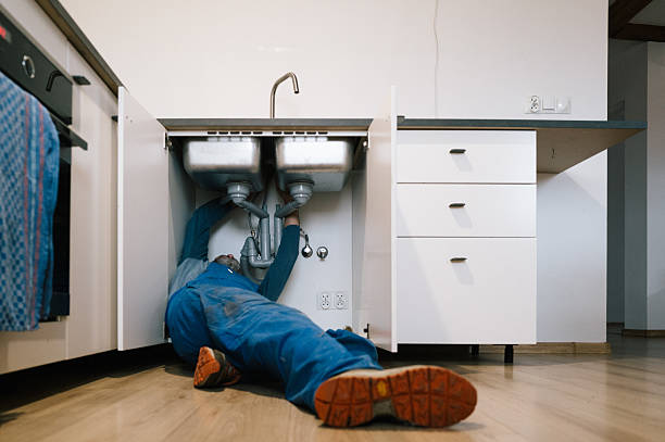 Professional Emergency Plumber technician working in Grandy, MN